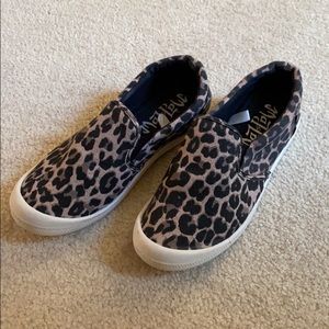 Slip on cheetah printed shoes